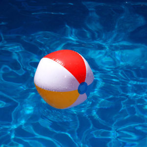 colorful beach ball in a pool