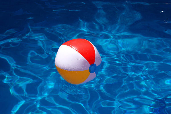 colorful beach ball in a pool